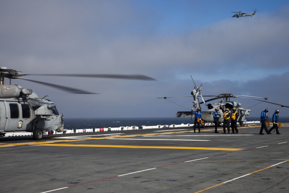 US Navy Seahawk helicopters take off from USS Makin Island to conduct search and rescue efforts off the southern California coast (Picture: US Department of Defense).