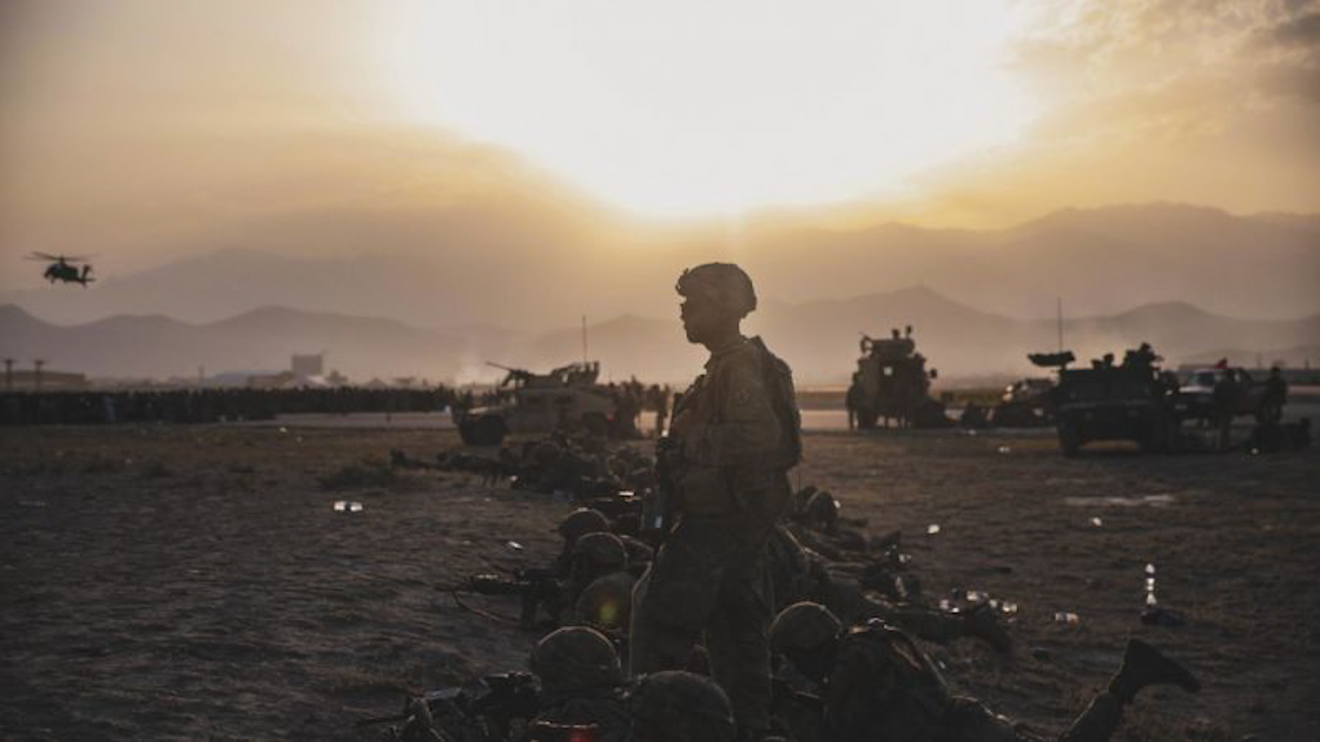 US Army Soldiers assigned to the 10th Mountain Division stand security at Hamid Karzai International Airport, Kabul, Afghanistan