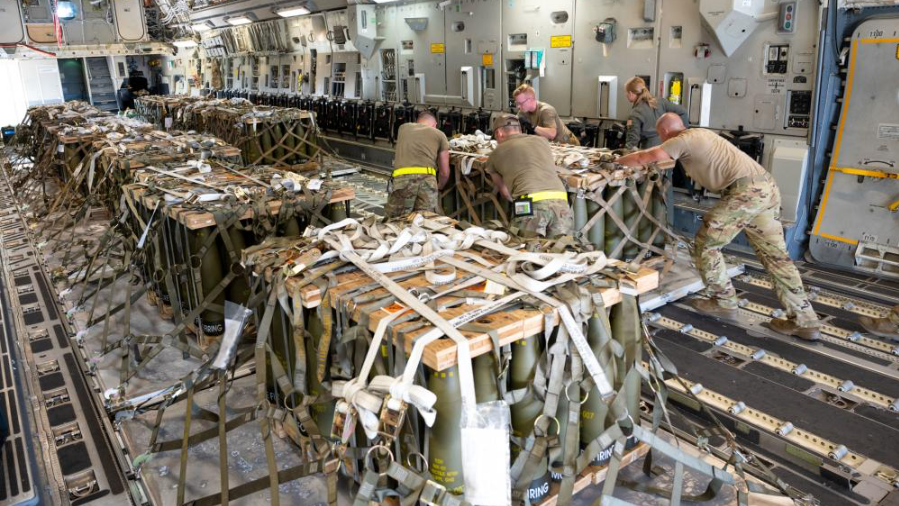 Pallets of ammunition being loaded onto a C-17 Globemaster III bound for Ukraine
