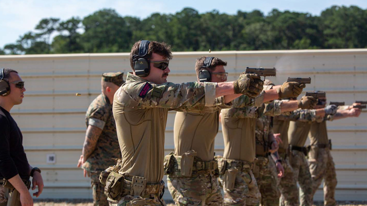 US Marines and British Royal Marines training with M18 pistols in order to increase proficiency during Exercise Tartan Eagle (Picture: SSgt. Servante R. Coba).