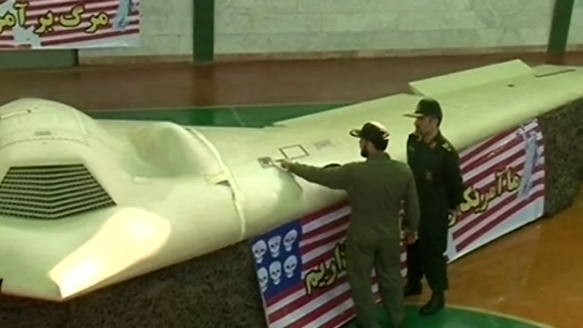 A US RQ-170 Sentinel Stealth Unmanned Aerial Vehicle captured by the Iranian military (Picture: Iranian State TV)
