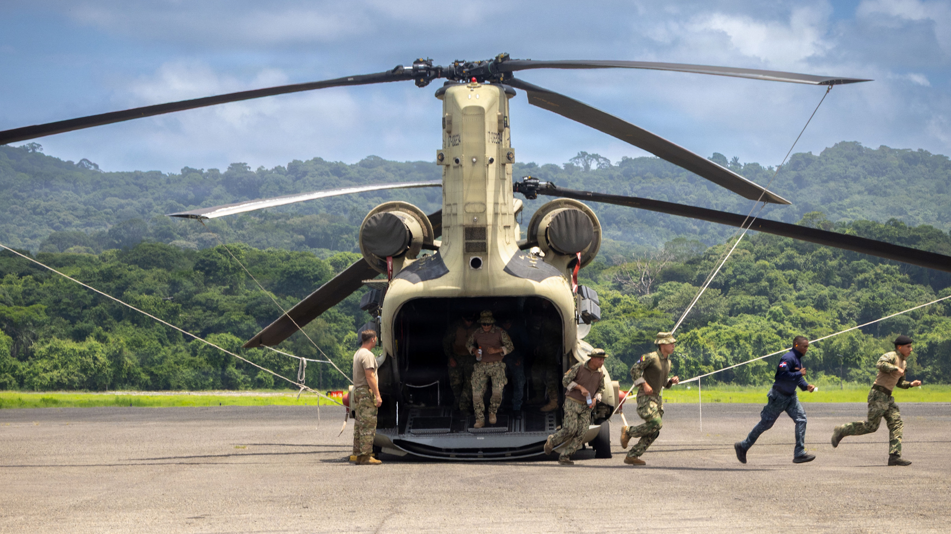 US personnel and partner nations conduct procedures drills with a CH-47F Chinook at the Aeropuerto Internacional Panama Pacifico (Picture: US Department of War)