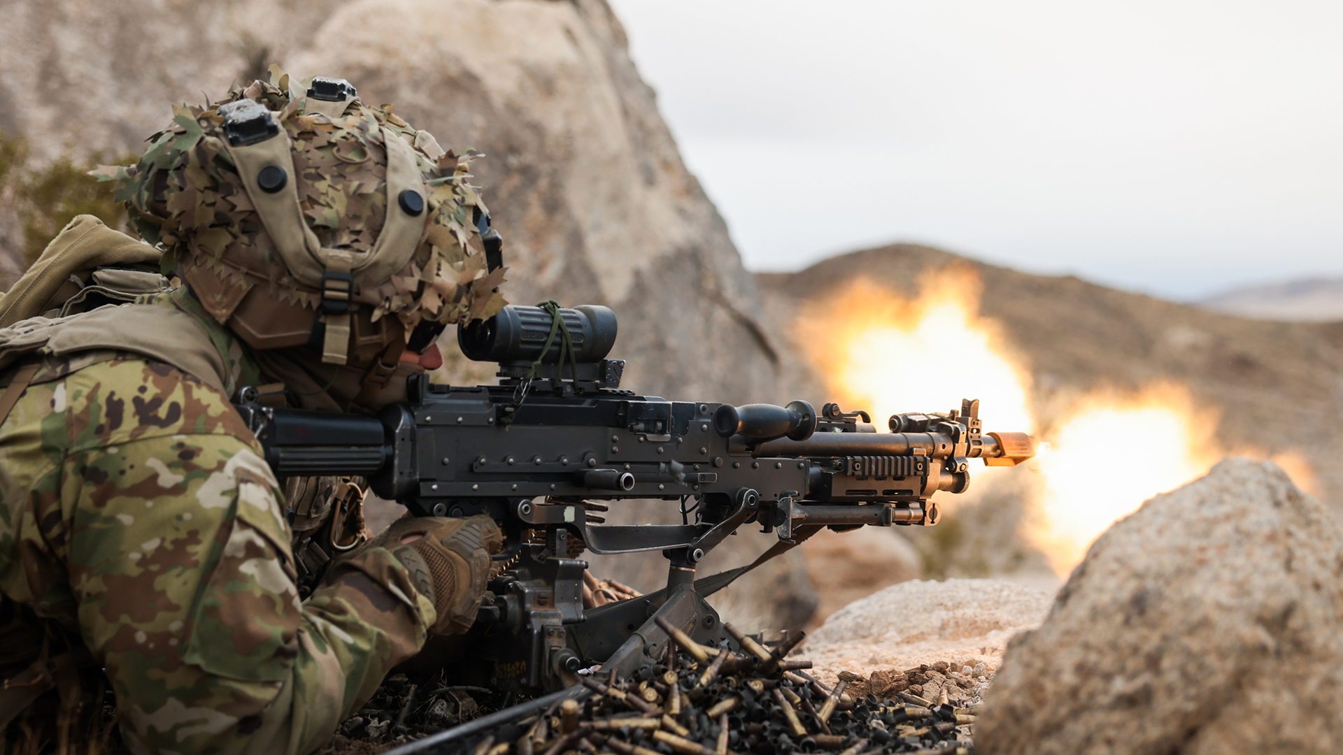 This US soldier opens fire with an  L249 Light Machine Gun while acting as the enemy