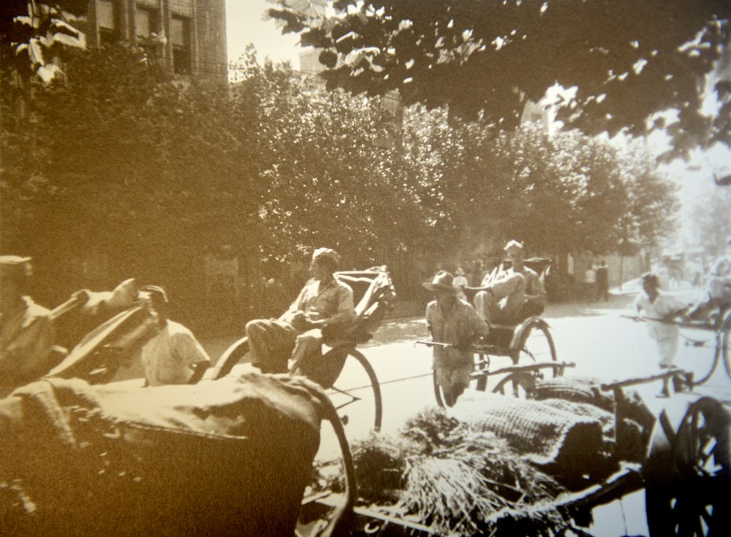 US soldiers on a rickshaw looking around the street of Namdaemun in September 1945 by USAG- Humphreys
