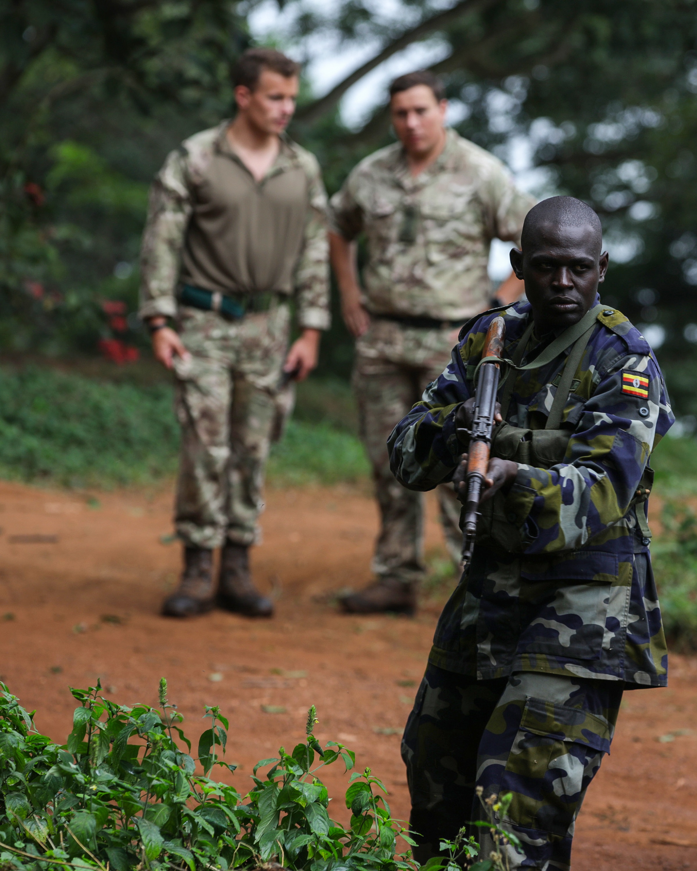 Members of the Royal Navy working with Ugandan soldiers on Lake Victoria, East Africa (Picture: Royal Navy)