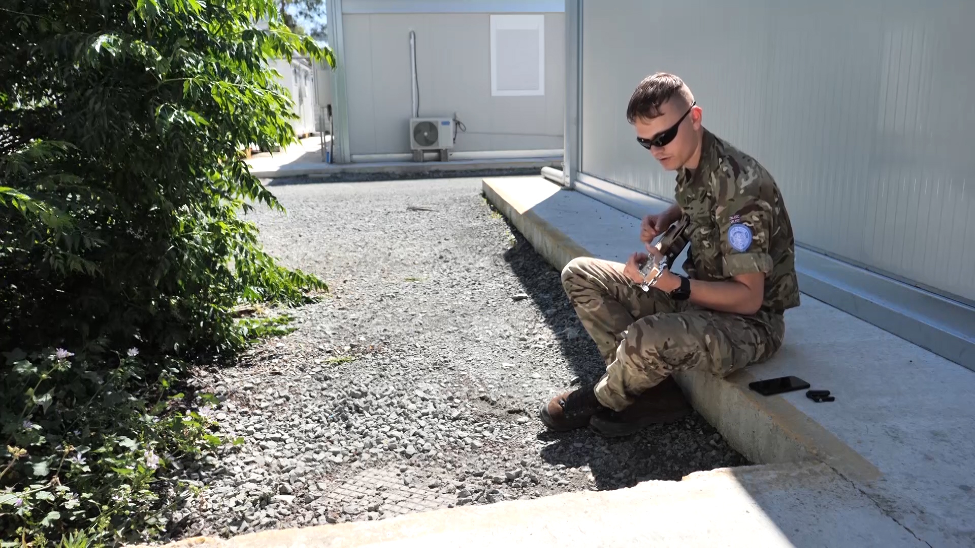 Uk troop plays guitar in Cyprus during op Tosca deploument USED ON 290520 CREDIT 7 Rifles.jpg