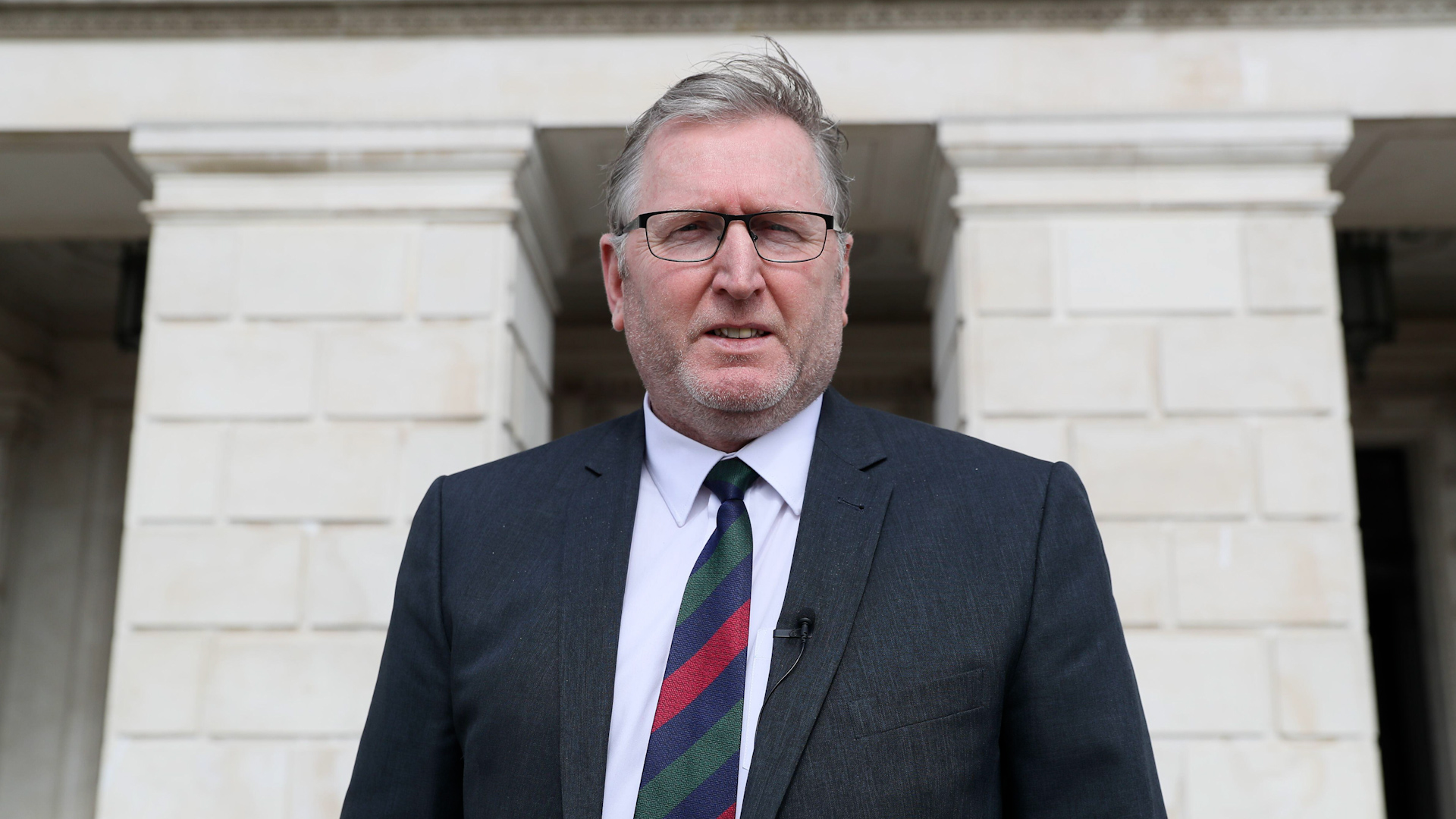 Cover image: Library photo of Doug Beattie outside Stormont (Picture: PA Images/Alamy Stock Photo).