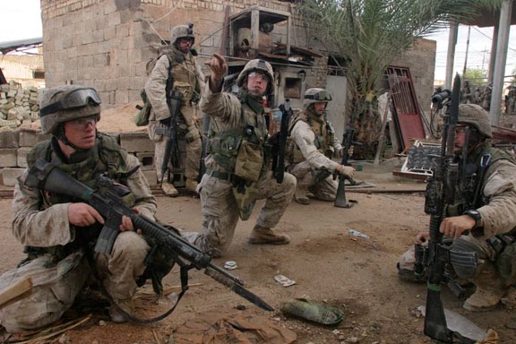 U.S. Marines with OKC-3S bayonets fixed to their M16A4 