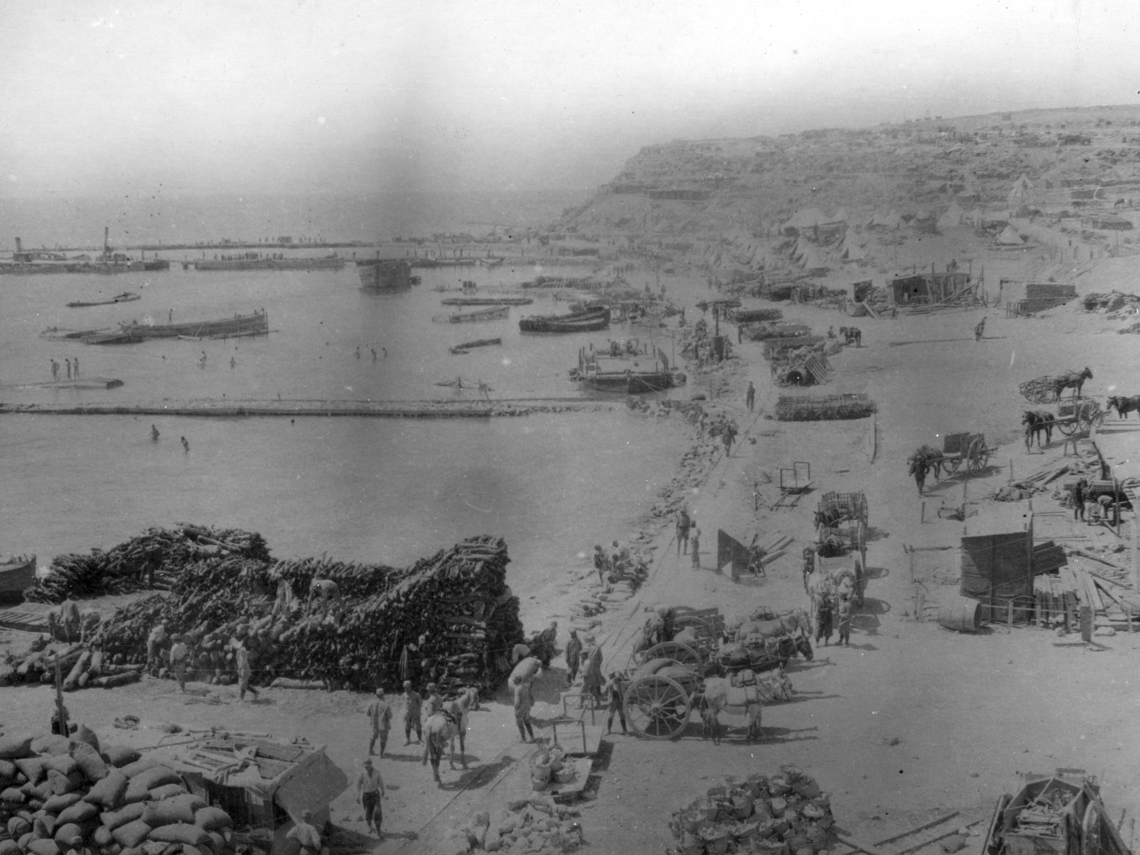 Unloading supplies at Anzac Cove, Gallipoli, Turkey, 1915 by National Library NZ