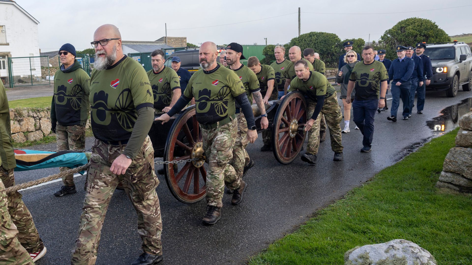 The volunteers, including military personnel and veterans, pushed the 1-Ton Field Gun for up to 10 hours a day