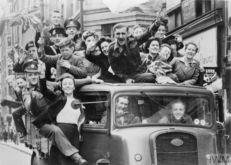 Victory In Europe Day VE Day Celebrations Black And White Flags Waving Union Jack Credit © IWM (HU 41808)
