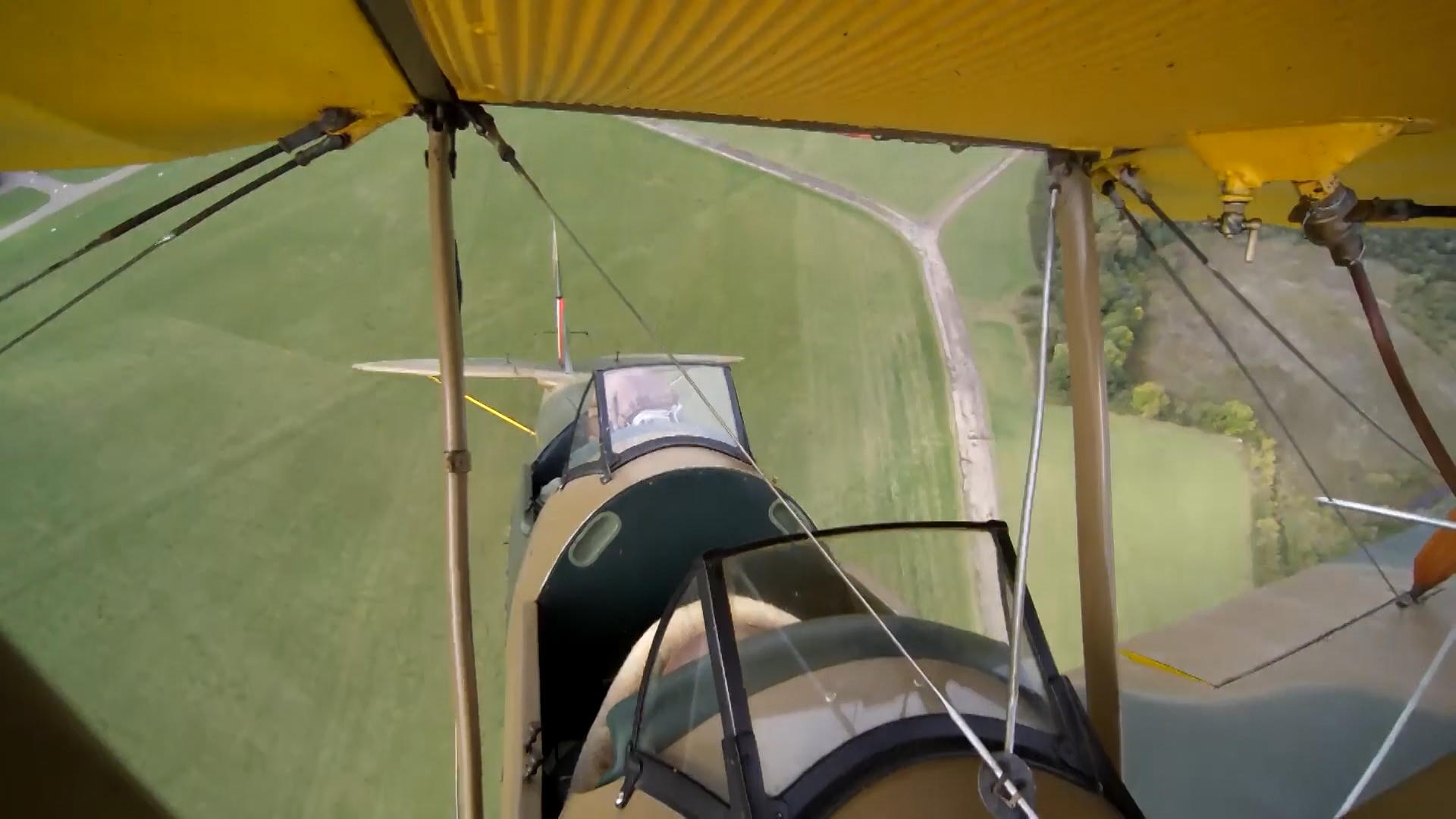Mr Hughes (rear) completes a loop-to-loop.