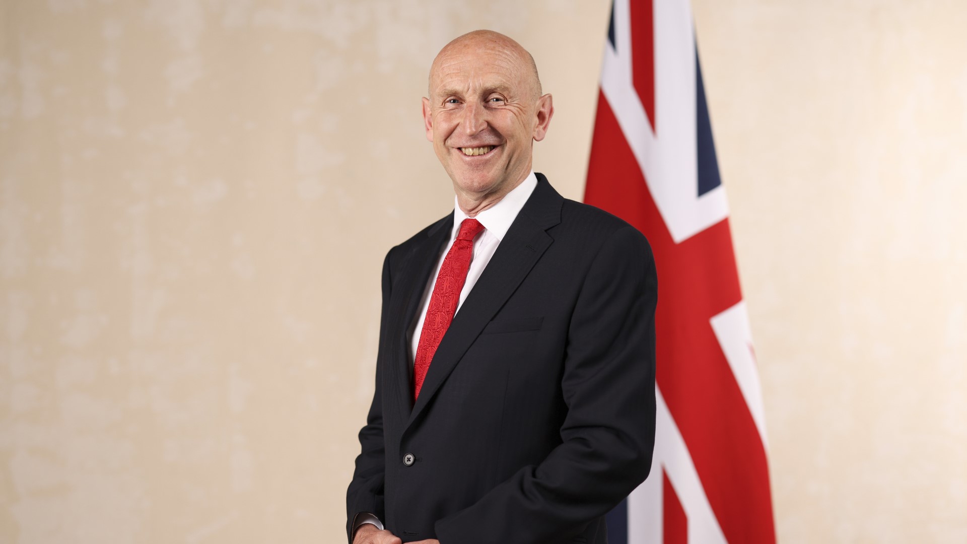 Secretary of State for Defence John Healey poses for his official photo