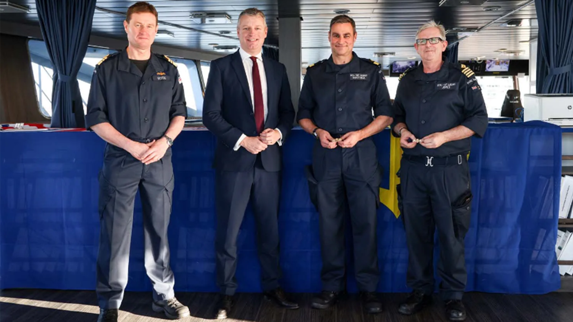 Vice admiral Andrew Burns, Minister of the Armed Forces Luke Pollard MP with Commadore Sam Shattock and Captain Martin Jones holding their pins (Picture: Royal Navy)