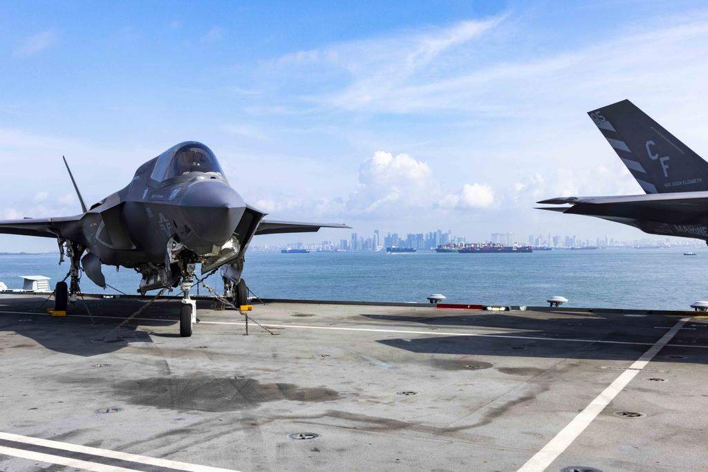View of Singapore skyline from the flight deck of HMS Queen Elizabeth 260721 CREDIT HMS Queen Elizabeth Twitter.jpg