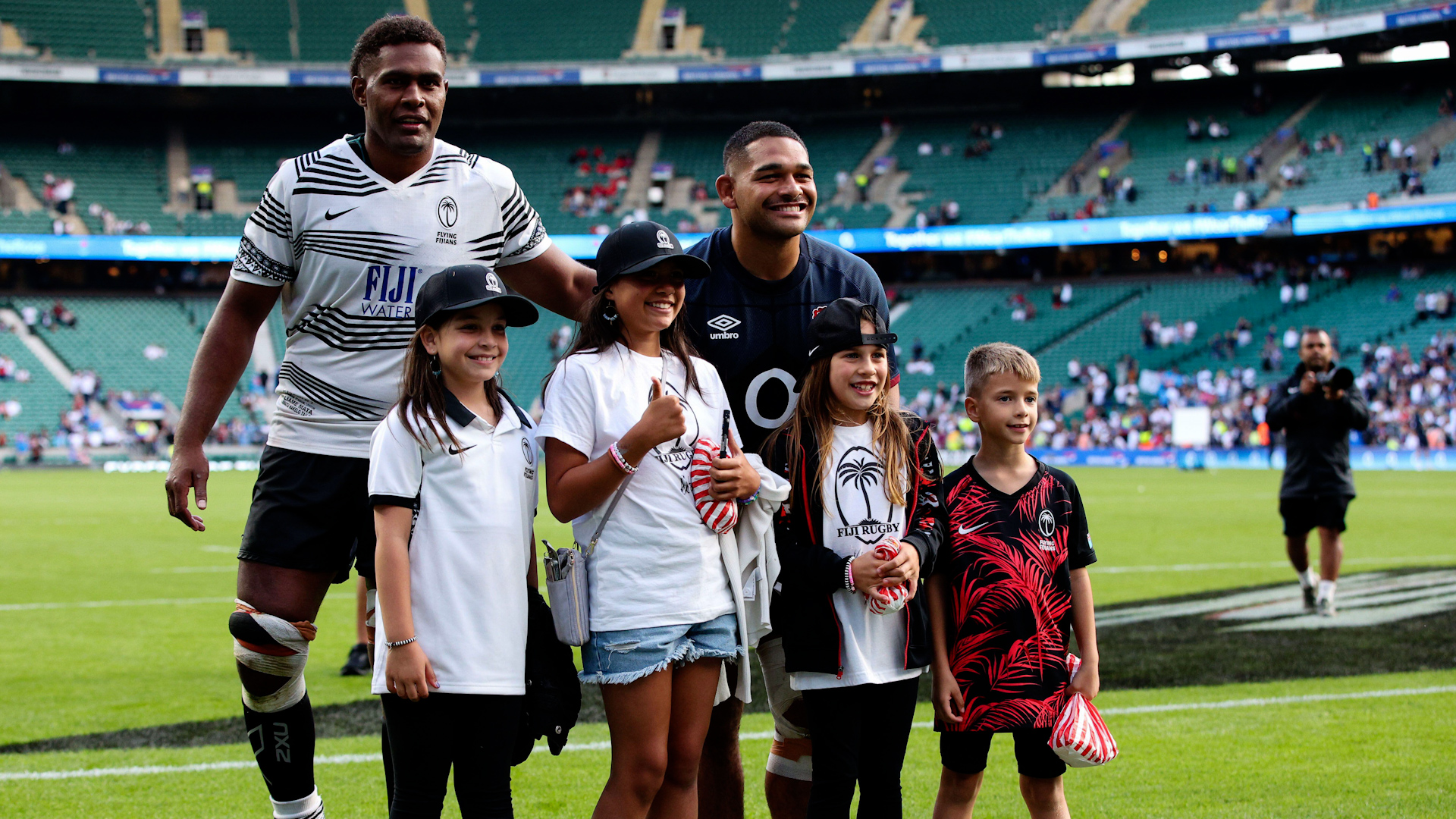 Viliame Mata and Sam Matavesi of Fiji celebrate with family after the Summer Nations Series International match between England and Fiji at Twickenham Stadium Image ID 2RM1G6D CREDIT Craig Mercer Alamy Stock Photo
