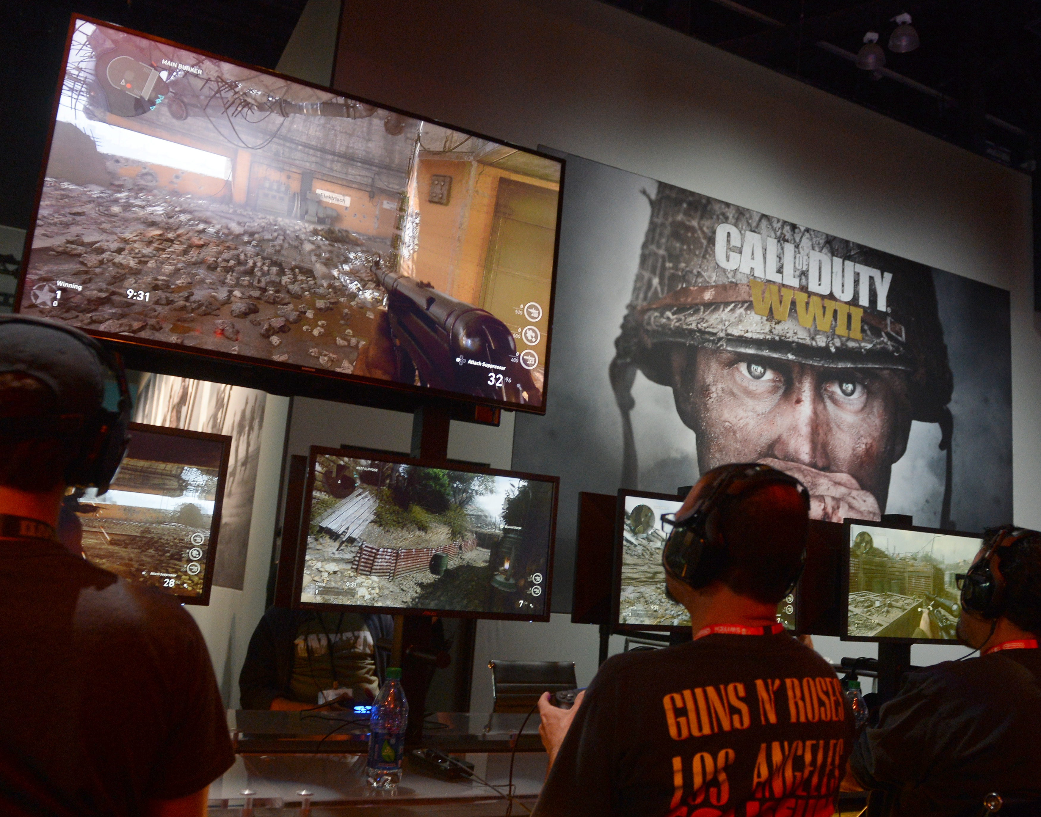 Visitors to games expo play Call of Duty WWII