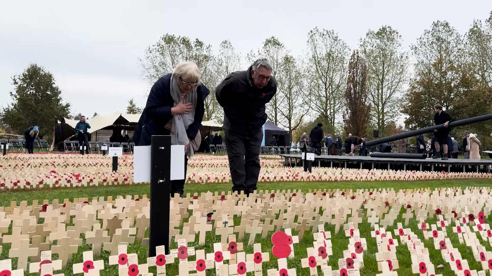 Visitors studying crosses at an RBL field of remembrance 011124 CREDIT BFBS