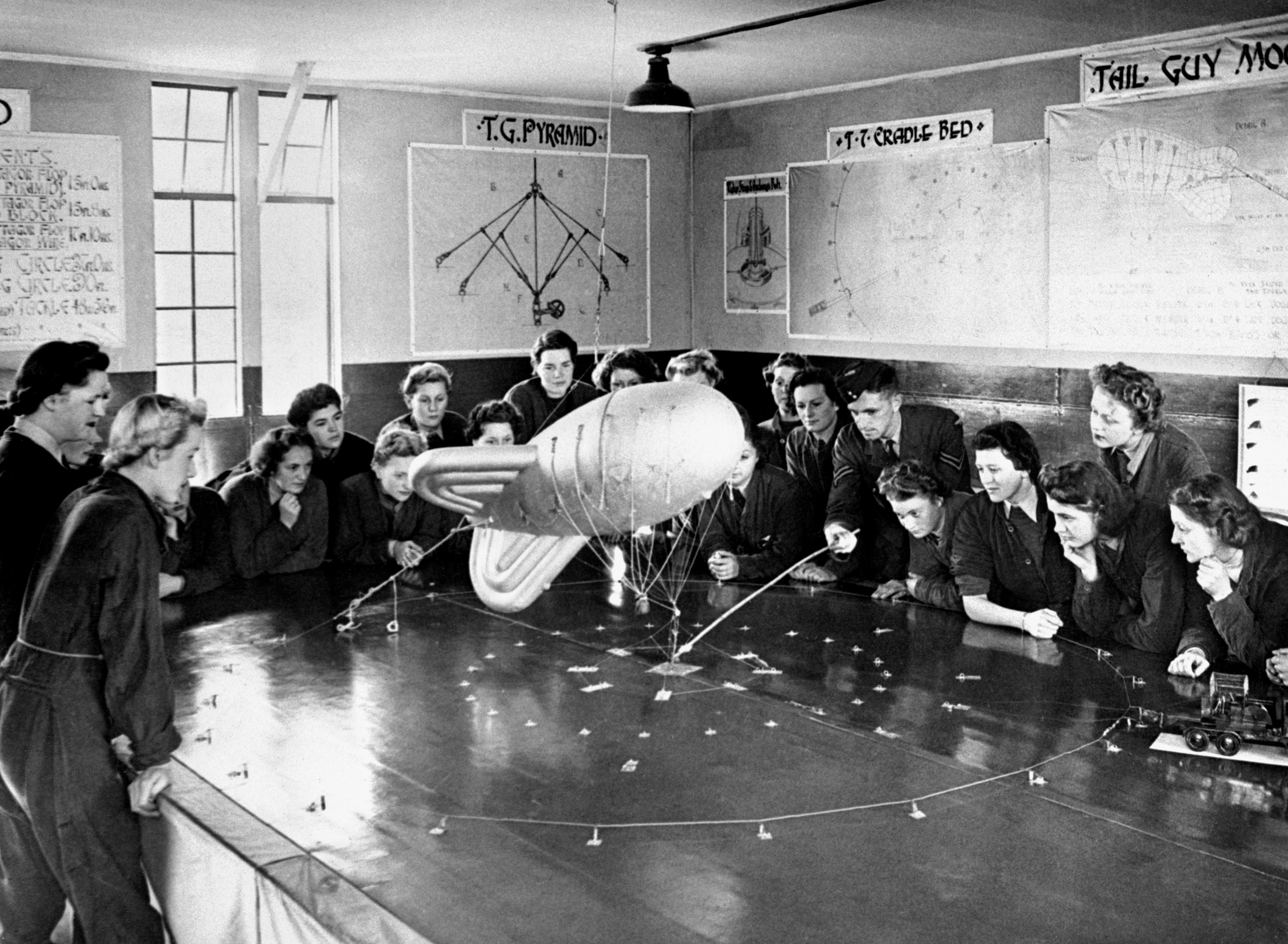 WAAFs being instructed on mooring barrage balloons