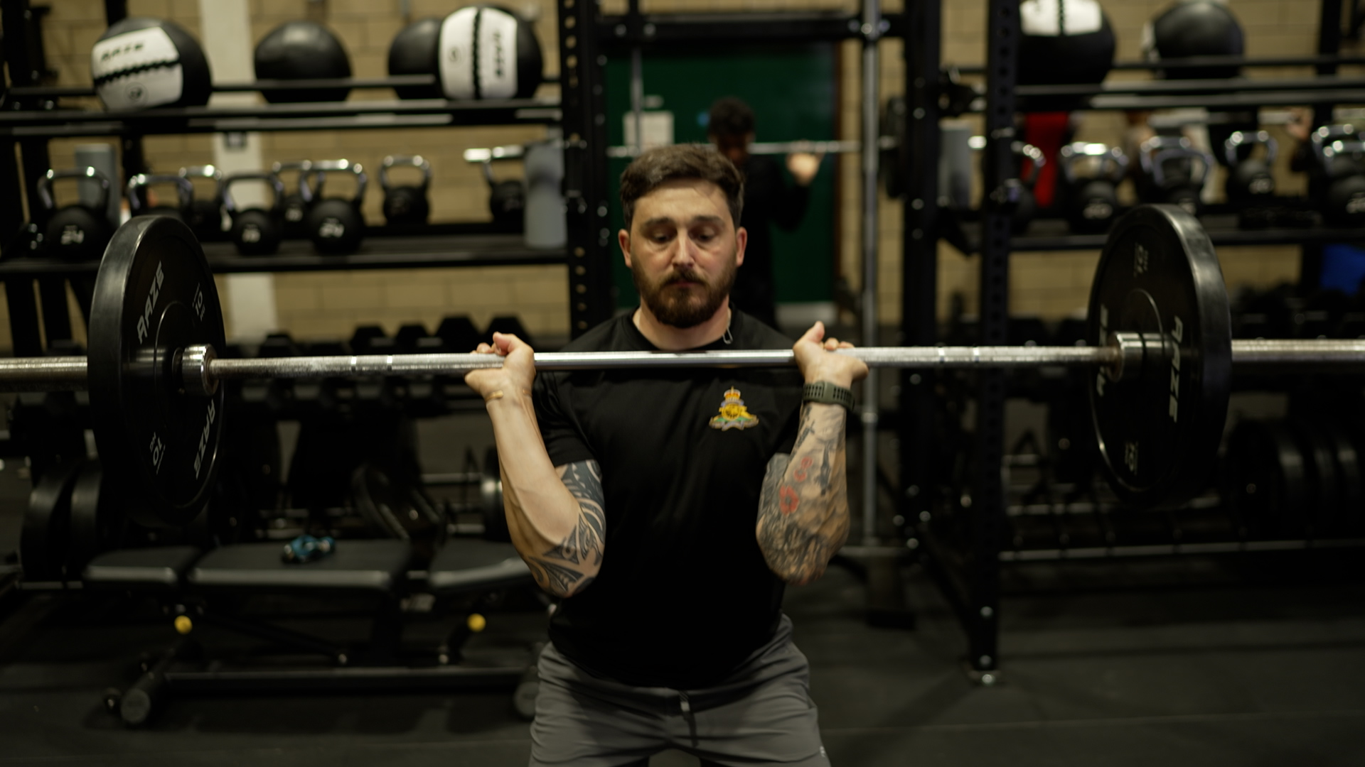 WO2 Aaron Hatt does weightlifting as part of a BAWF class session at Larkhill Camp Wiltshire
