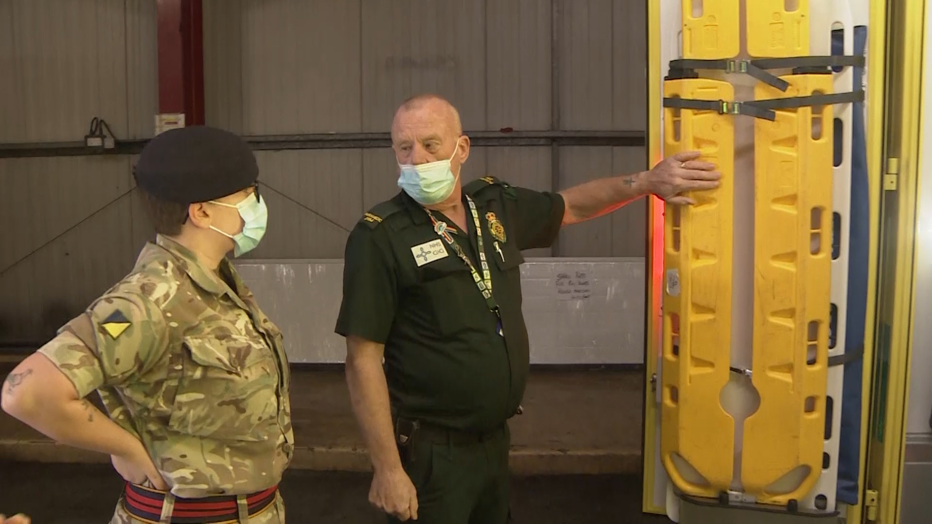 Welsh Ambulance and British Army personnel near Welsh Ambulance vehicle during covid coronavirus pandemic 080221 CREDIT BFBS.jpg