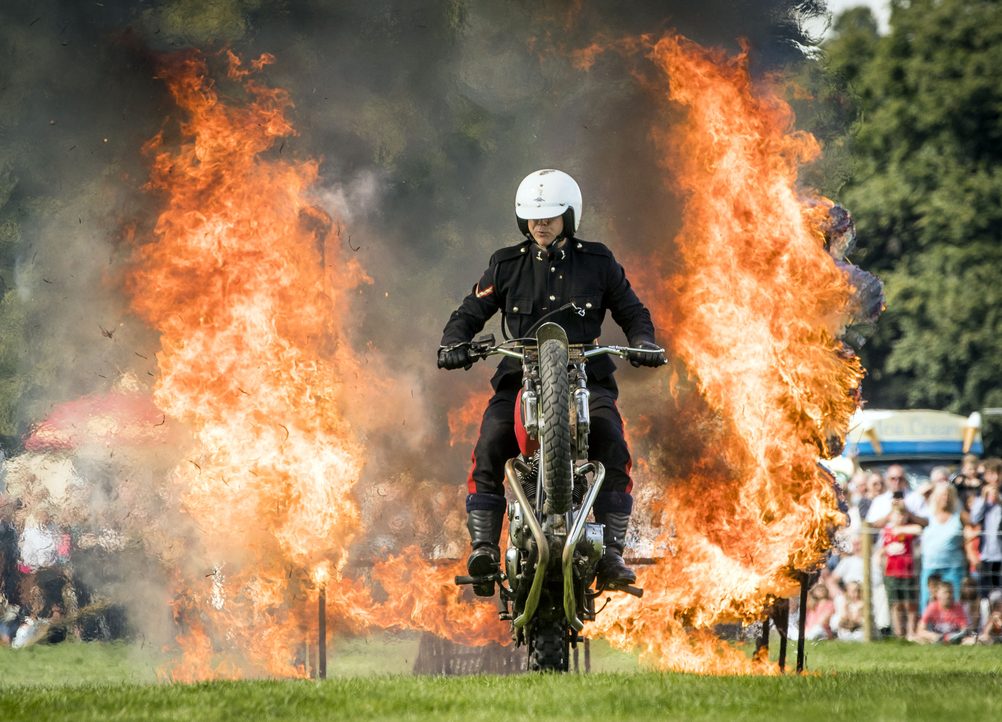 White Helmets fire jump trick