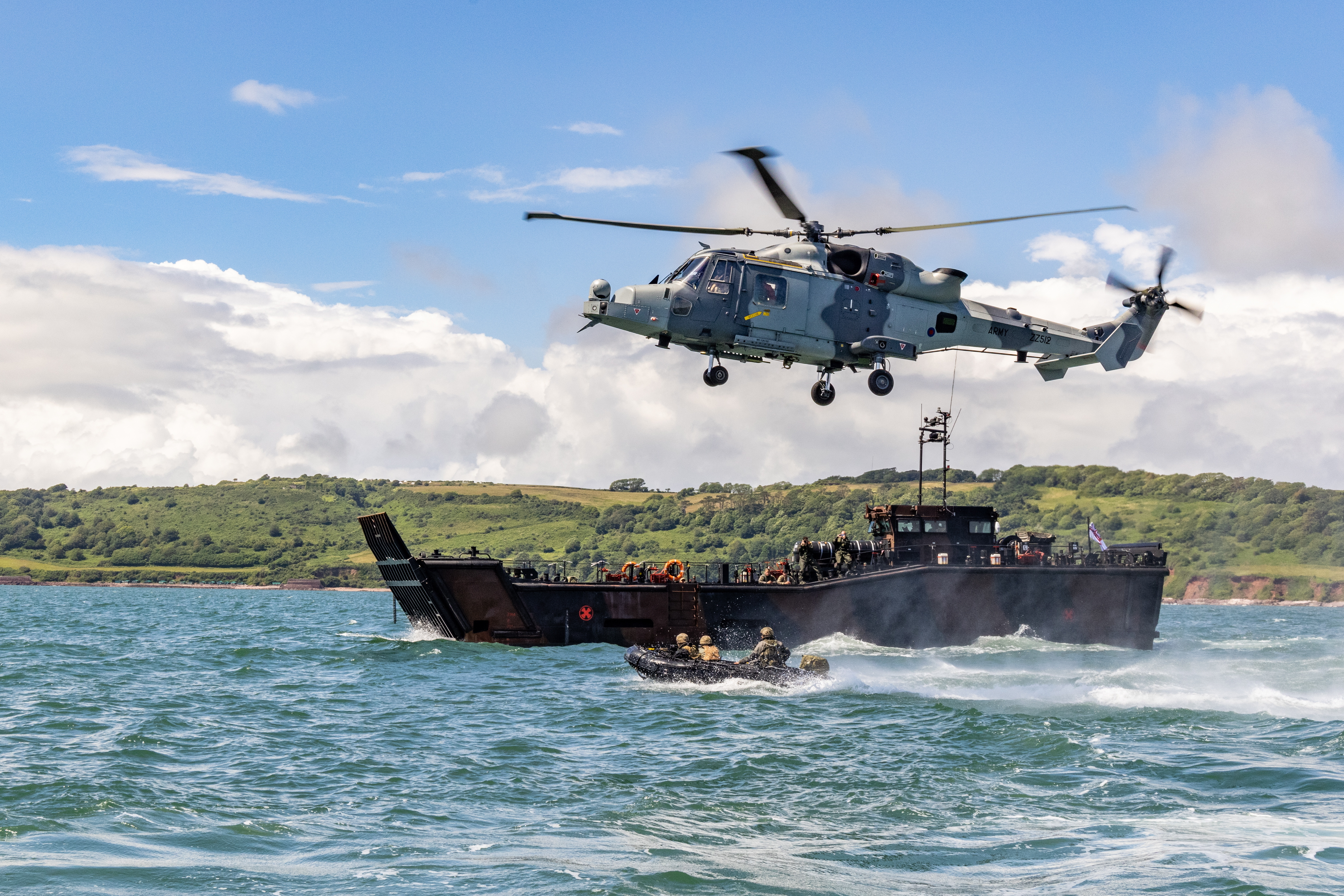 Wildcat above an LCU Mk 10 and Inflatable Raiding Craft during Ex First Wave