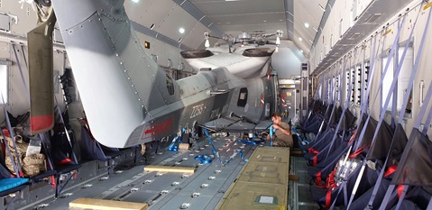 Work being done to upgrade software on a Wildcat helicopter so it can assist with Navy operations in the Gulf (Picture: Royal Navy).