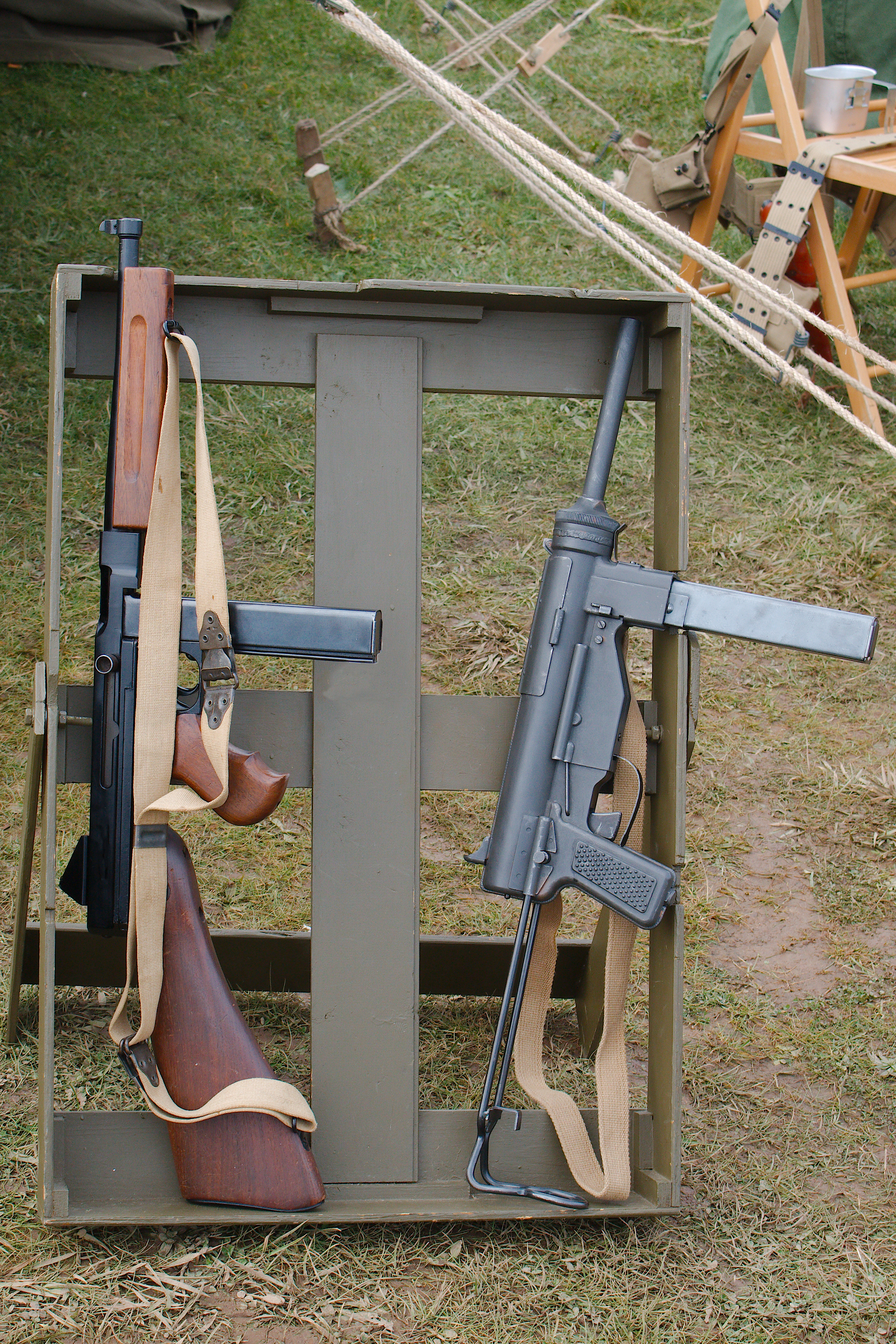 World war 2 era historical image of Thompson and M3 Grease Gun submachine guns from shutterstock