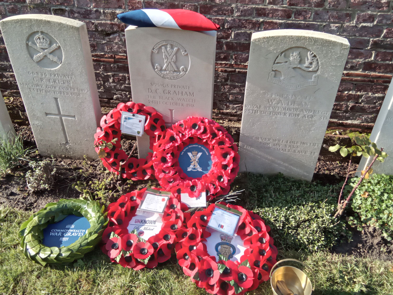 Wreaths are laid in tribute to Pte David Graham CREDIT Crown Copyright