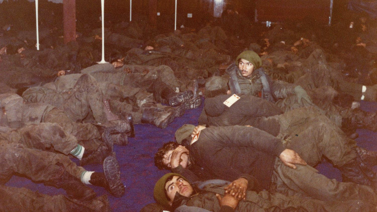 From the book 'An Ordinary Doctor: General Practice And Beyond' image shows prisoners of war in the passenger lounge of SS Canberra CREDIT Dr Susie West