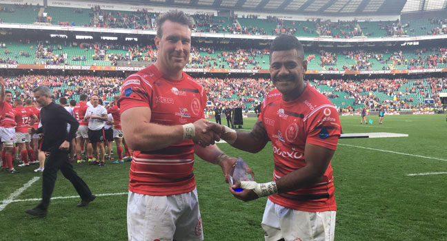 Army captain Rob Lennox with man of the match Junior Bulumakau