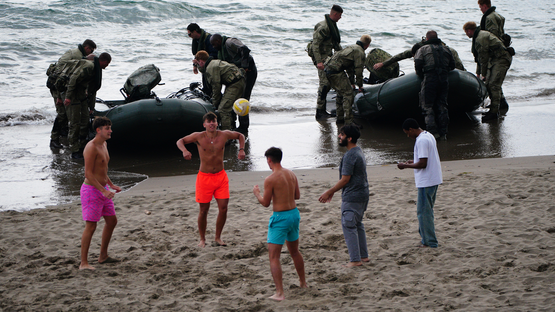 beach football with royal marines raiding drills cornwall CREDIT PA Wires.jpg