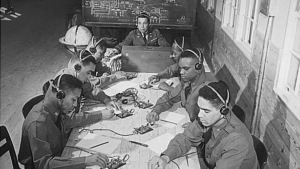 Black Army Air Corps cadets at Tuskegee Alabama learning how to send and receive code CREDIT National Archives and Records Administration