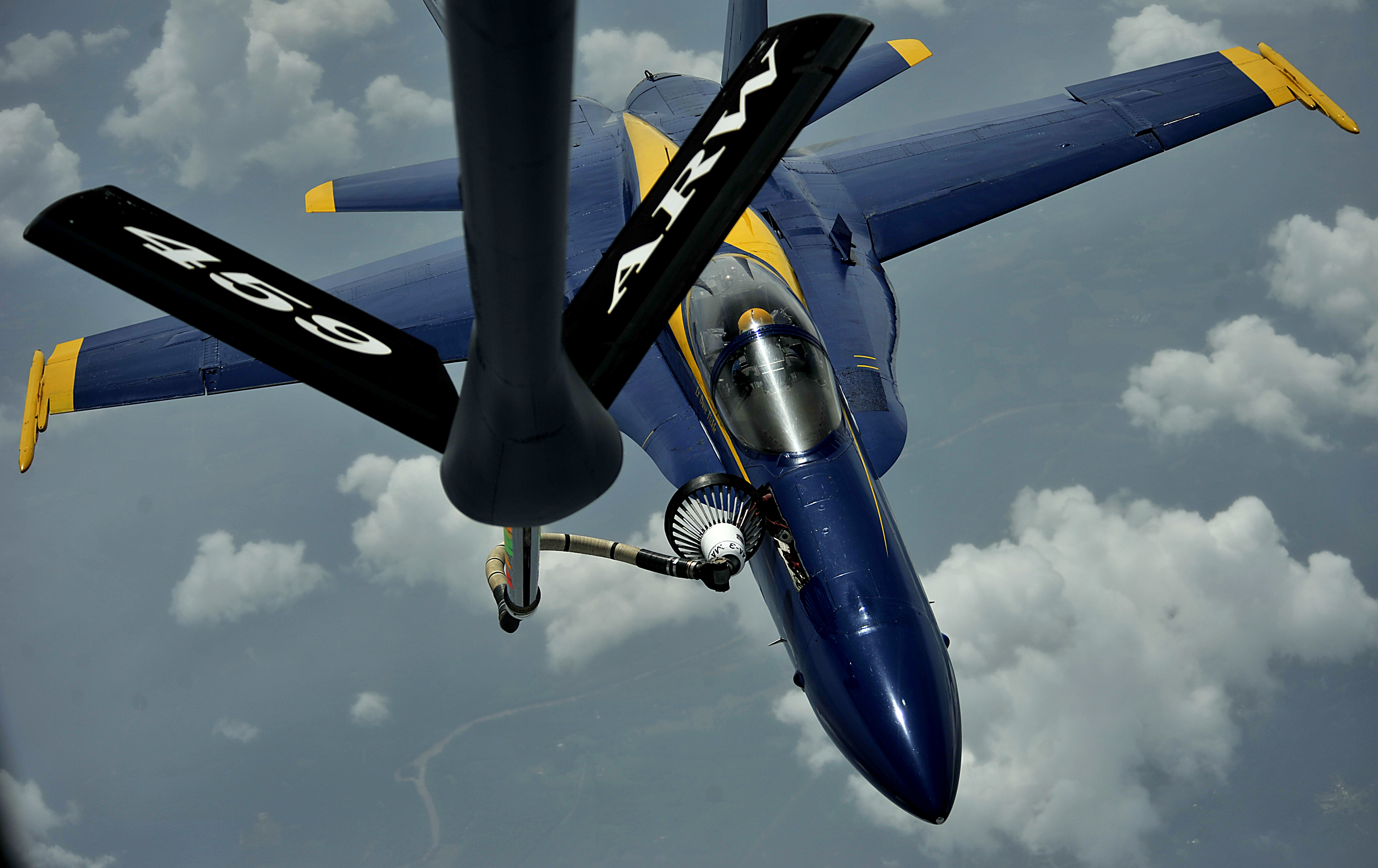 A KC-135 Stratotanker with the 756th Air Refueling Squadron, Joint Base Andrews Naval Air Facility, Md., refuels a F/A-18 Hornet strike fighter assigned to the US Navy flight demonstration squadron the Blue Angels (Picture: Master Sgt. Jeremy Lock /DVIDS).