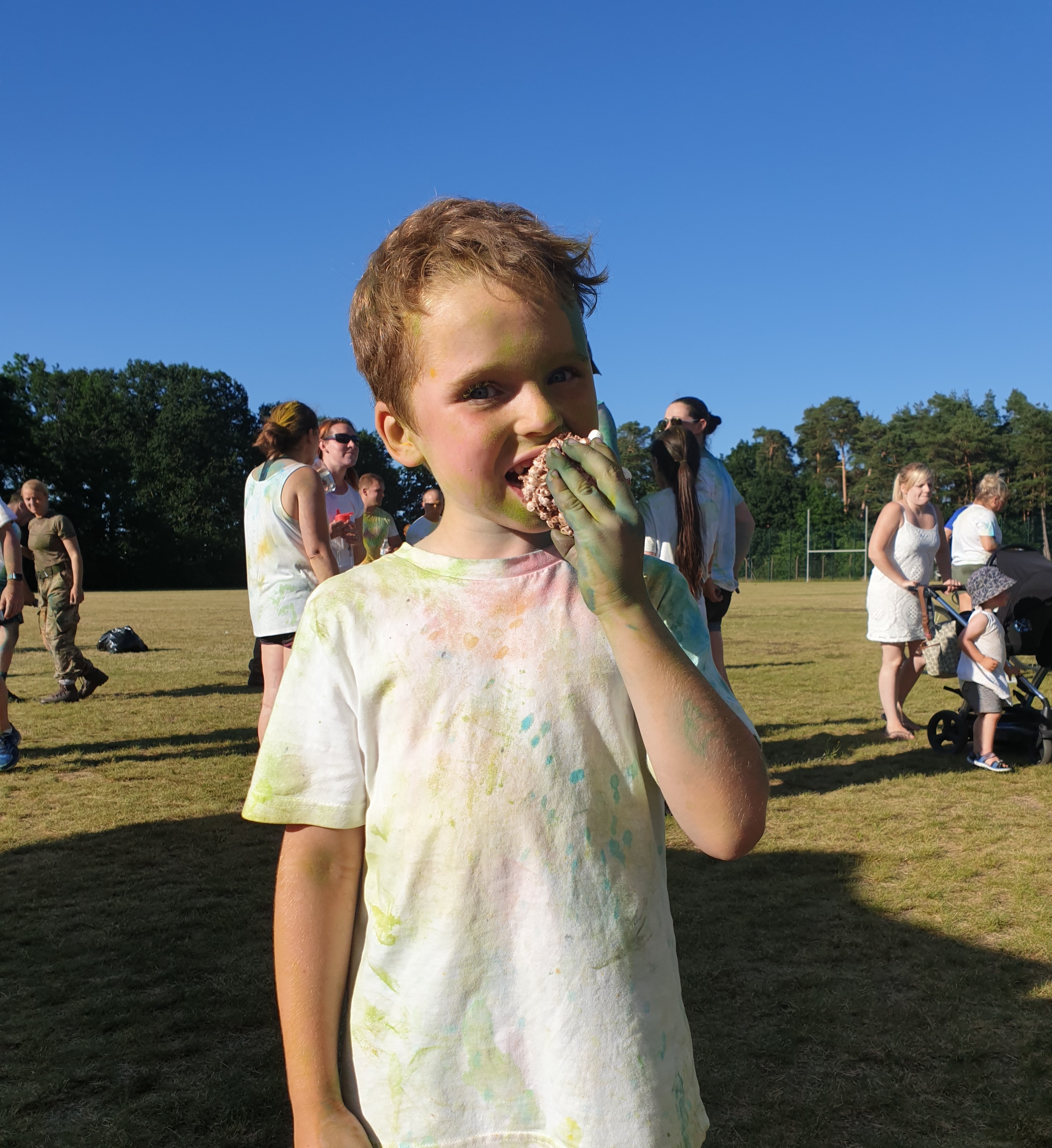 Boy eating Cake after finishing run