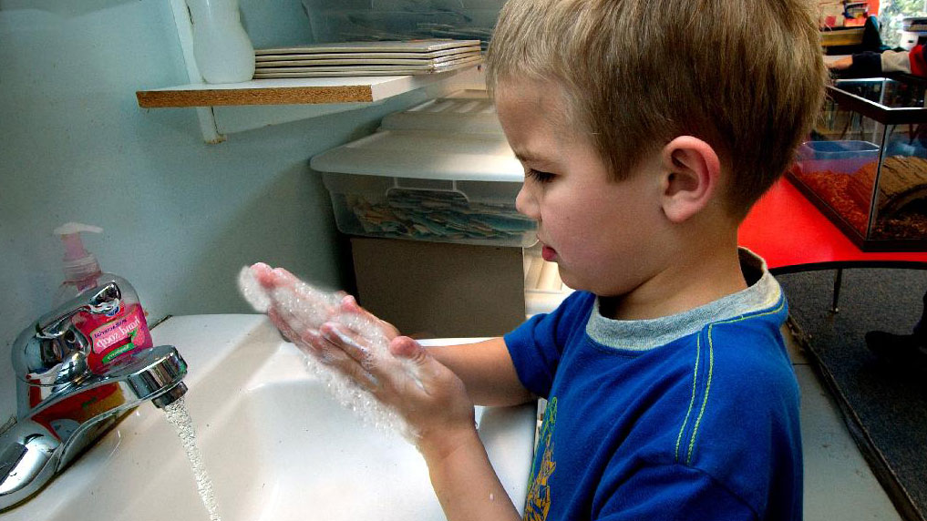 Child Hand Washing School COVID 19 Coronavirus Prevention Credit JumpStory