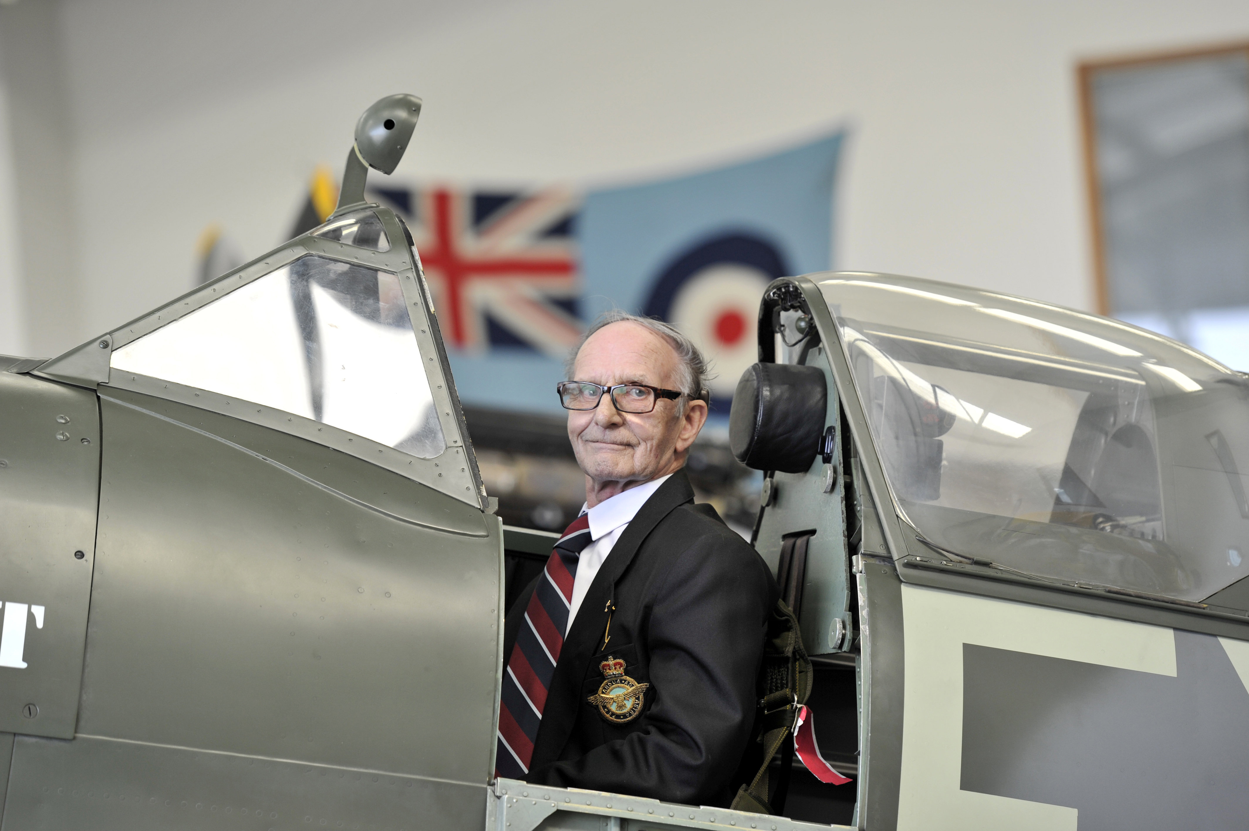 John Llewellyn on Spitfire plane - CREDIT SWNS