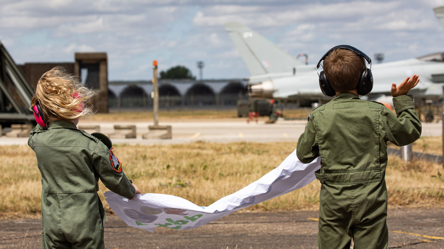 Children watch as 3 (Fighter) Squadron return from Op Biloxi and the Air Policing role they have been performing since April 2022 CREDIT Crown Copyright
