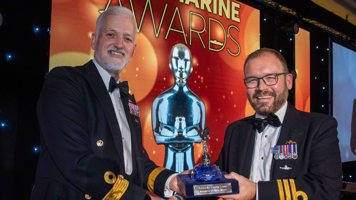 Commander Iain Fergusson receives his award at the 2023 Submarine Service Awards CREDIT Royal Navy