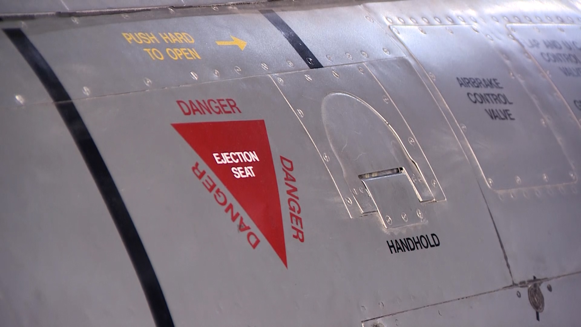 Danger Ejection Seat sign on a Gloster Meteor on display at the RAF Museum CREDIT BFBS