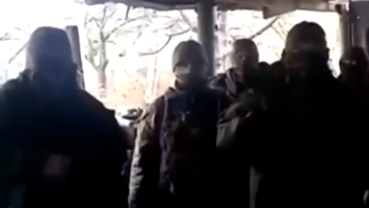 Masked Russian soldiers criticized their commander for using 'insane' tactics during the battle (Picture: Russian Telegram).