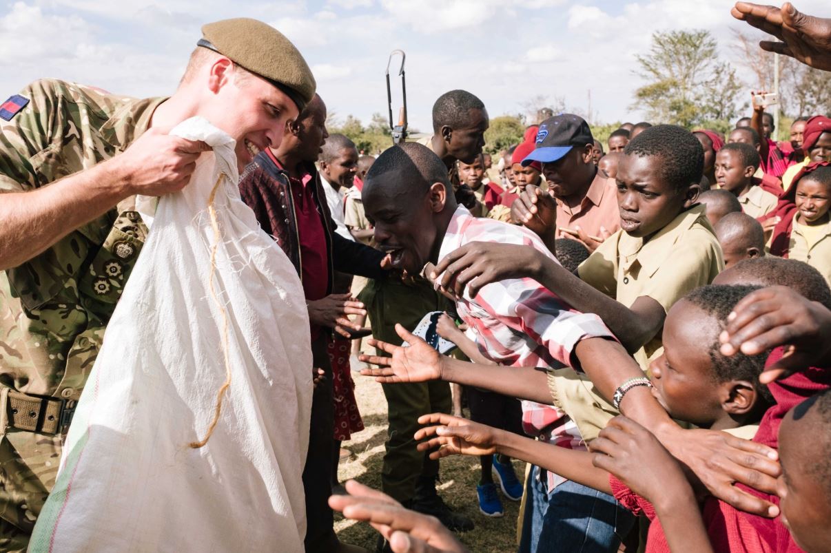 Prince William Giving out Footballs