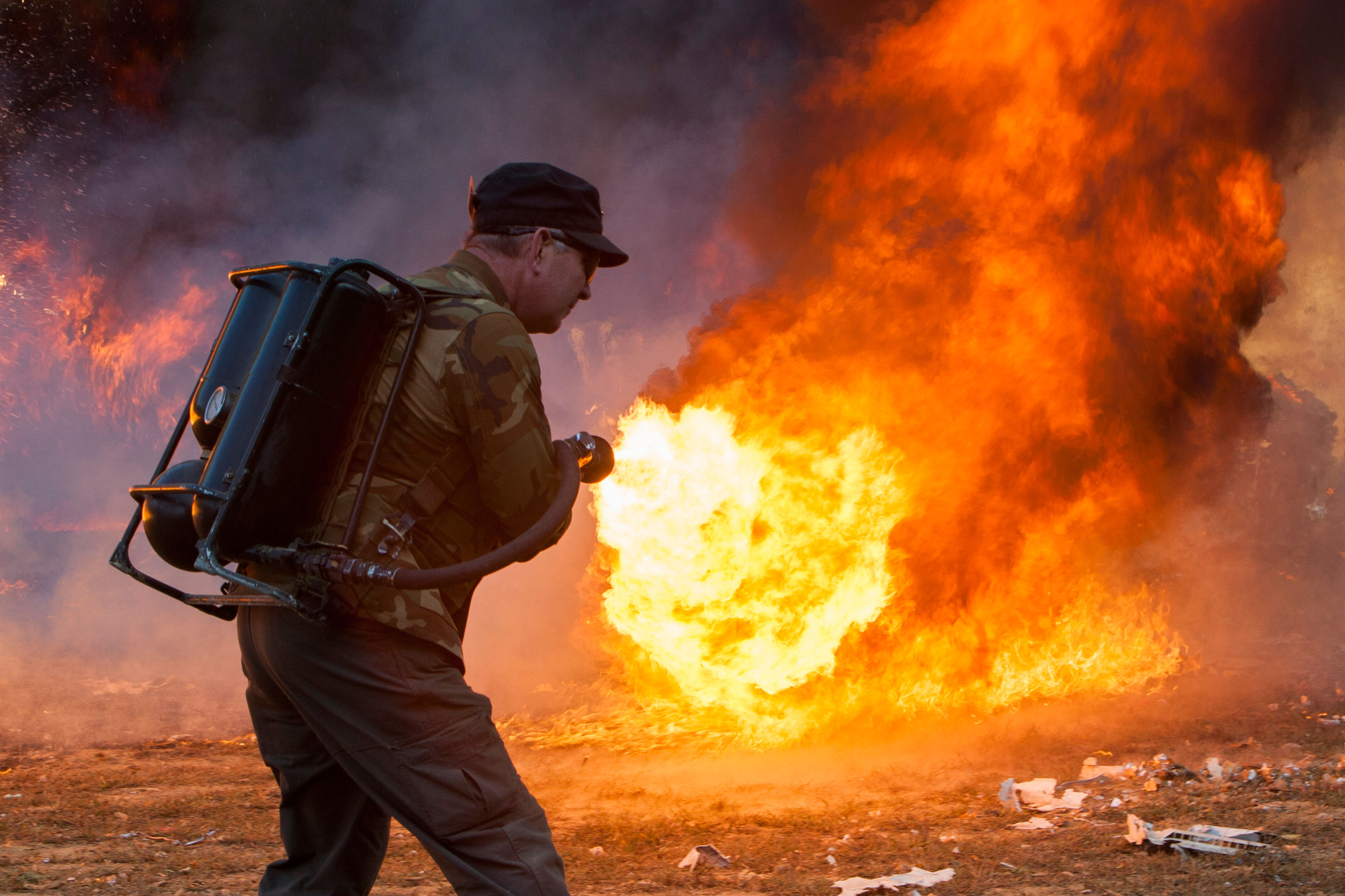 A flamethrower at the Knob Creek Machine Gun Shoot. Picture: Kristoffer Tripplaar / Alamy