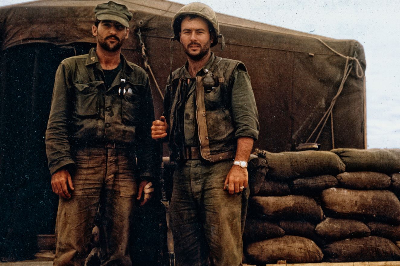 From left to right, Cpl Patrick Iacunato and 1st Lt. Harvey C. Barnum Jr. pose for a photo while serving in Vietnam Image ID 160729-N-ZW259-5132C CREDIT US Navy