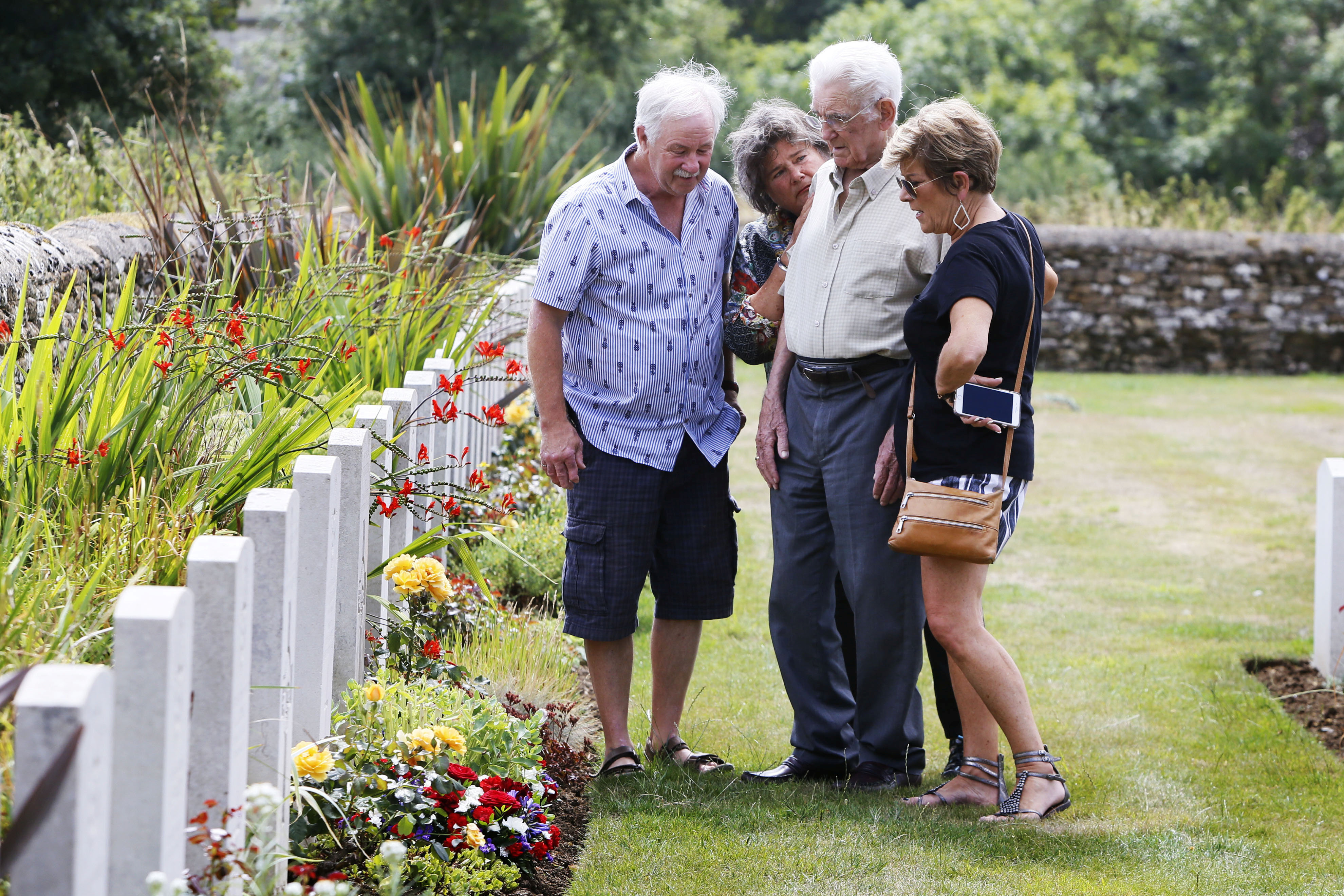 children of an American airman have tracked down the Brit who pulled him from his burning plane SWNS
