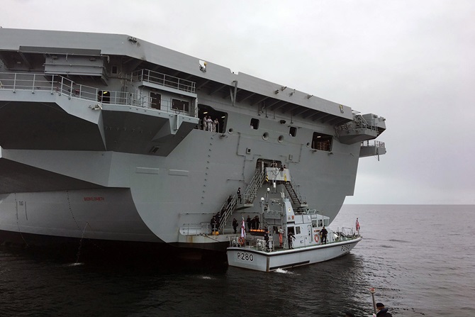 HMS Dasher at the stern of HMS Queen Elizabeth