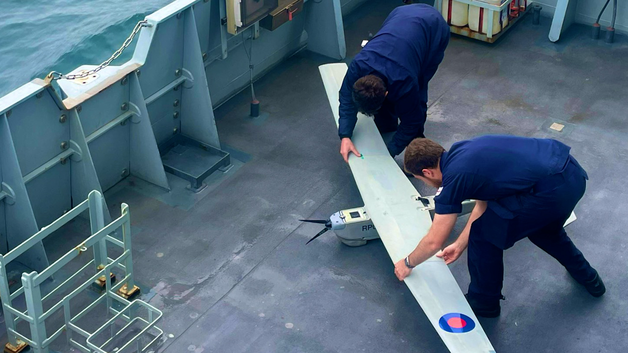 The crew of HMS Spey launching an uncrewed aircraft from the deck by hand (Picture: HMS Spey).