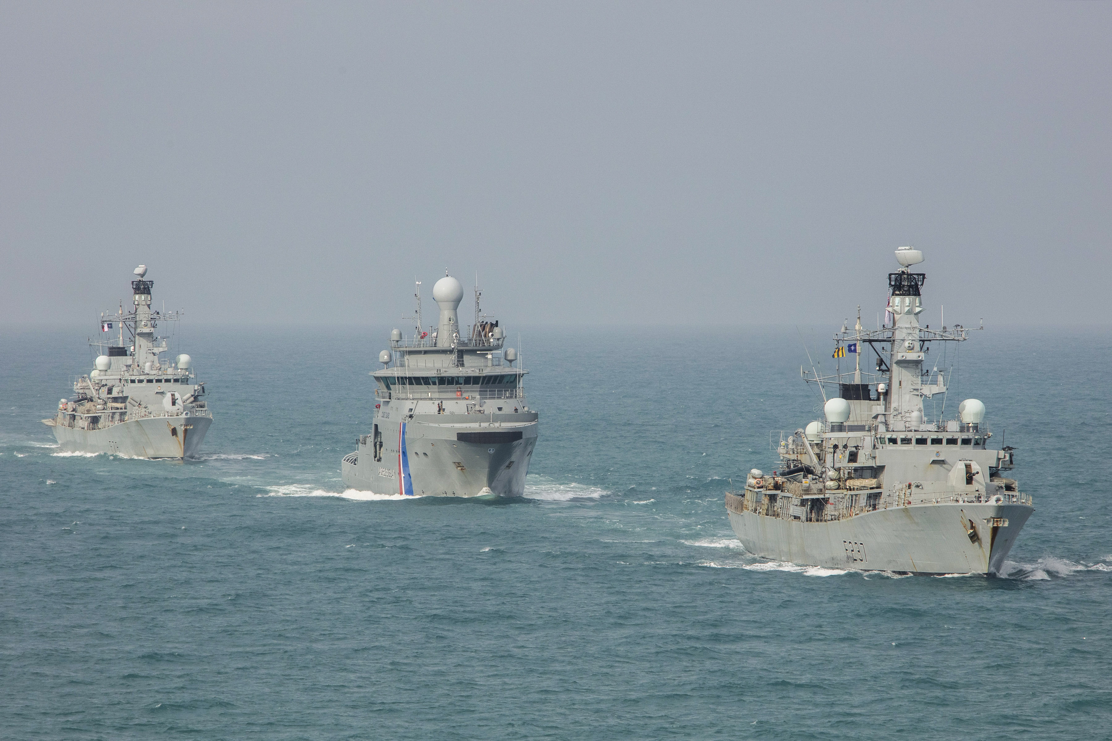 HMS Westminster and HMS Kent sail alongside Icelandic Coastguard ship during NATO's Exercise Dynamic Moose in June (Picture: Royal Navy).