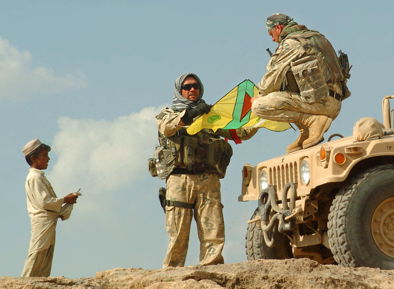 Polish Soldiers Help Afghan Children Experience Kite-Flying Joy
